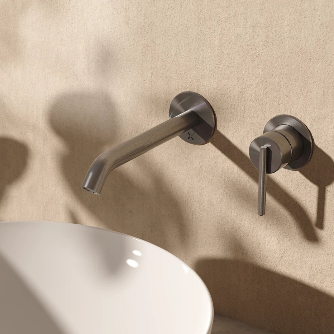 Wall mounted basin tap